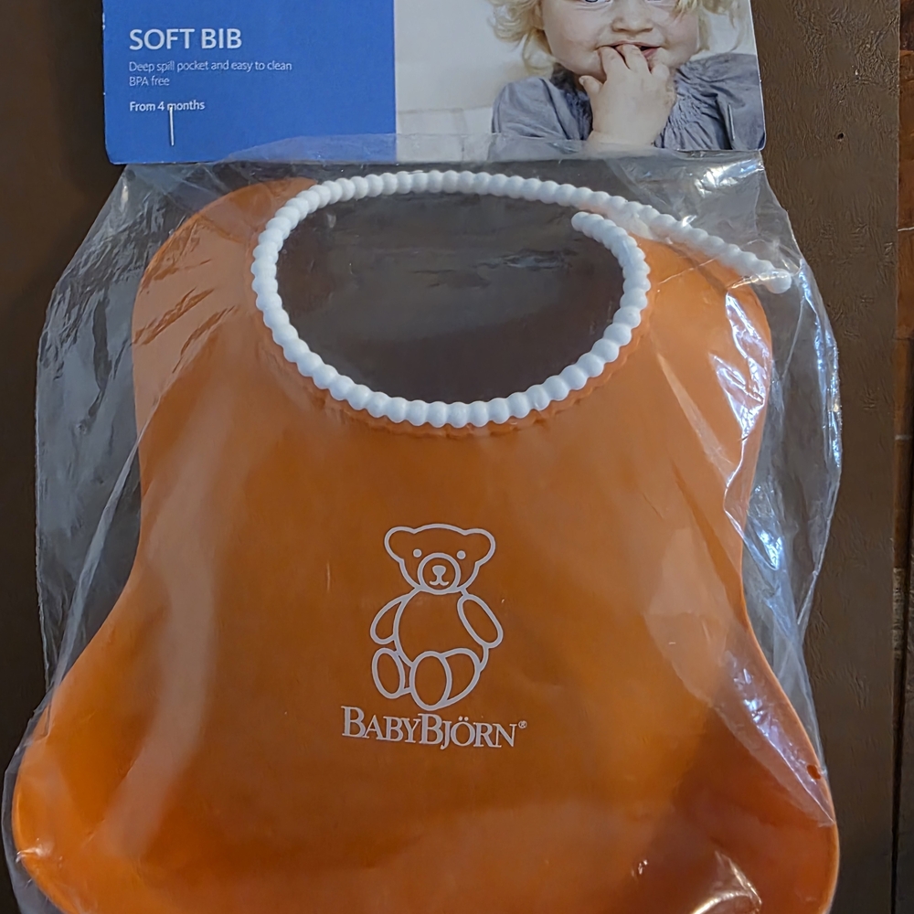 BabyBjorn Orange Silicone Soft Bib NEW NWT Baby Feeding Eating